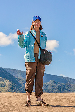 Annie Standing on a Dune