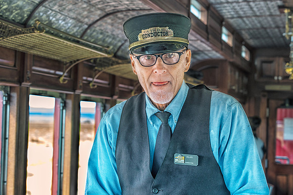 Conductor Taking Tickets on the Cumbres & Toltec RR